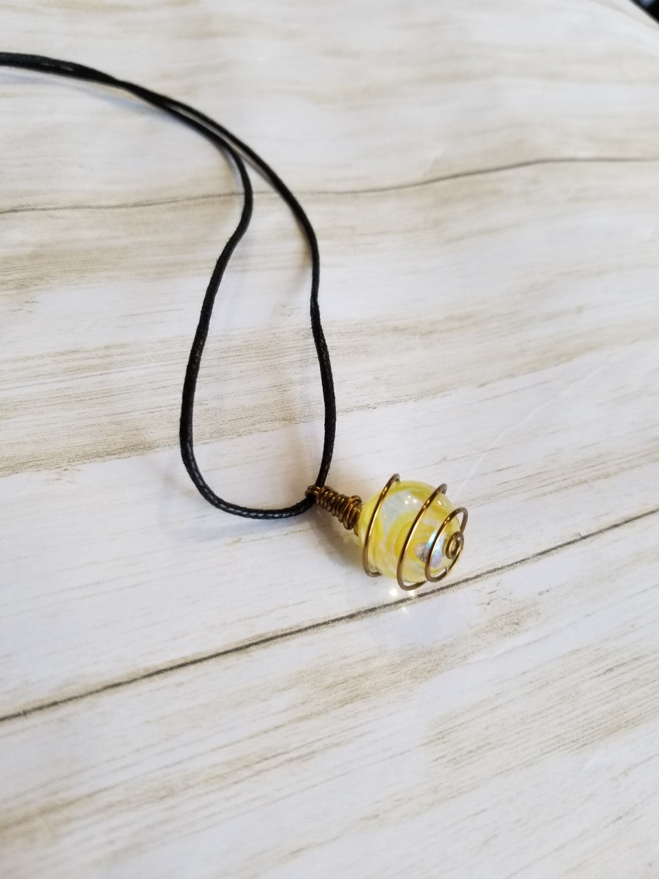 Clear with Yellow swirl hand wrapped pendant