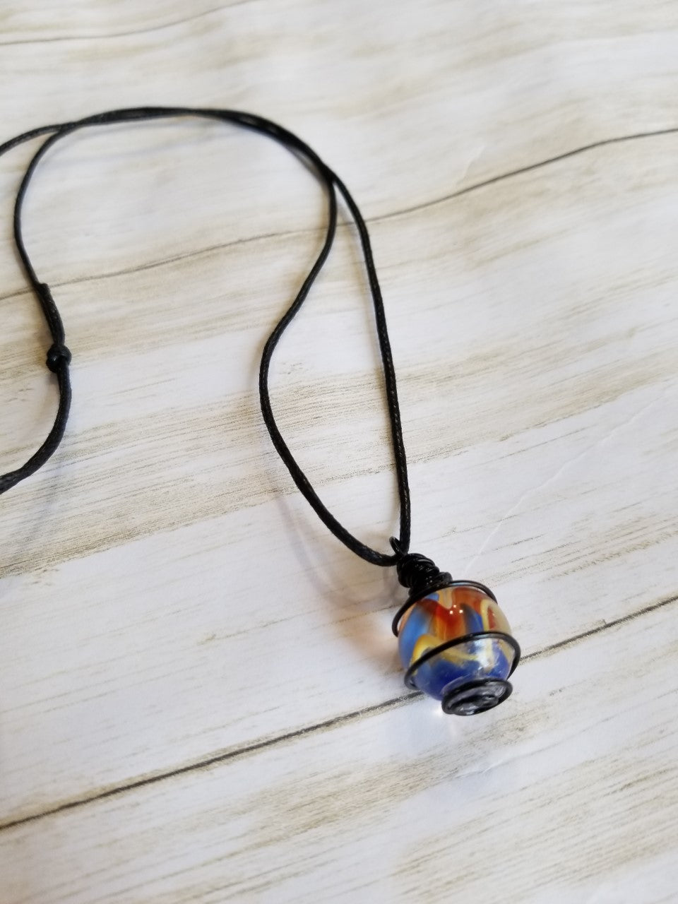 Clear Blue and Yellow swirl hand wrapped pendant