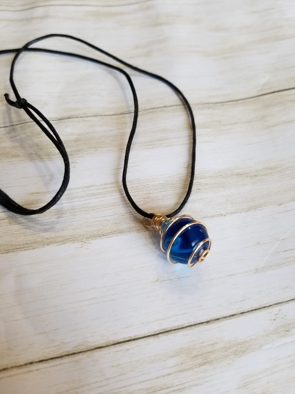 Blue and White swirl hand wrapped pendant